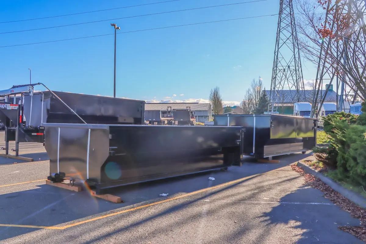 Roll-off dumpster ready for waste disposal at job site for Demolition Dumpster Rental in Clay